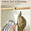 A vertical space-saving closet organizer with 12 hooks holding various clothing items on a wooden rod.