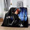 A black flannel throw blanket featuring a print of Michael Jackson in a dynamic pose.