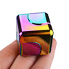 A vibrant, iridescent alloy metal fidget cube spinner held in a hand.