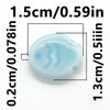 A light blue, oval-shaped ceramic fish bead is shown with dimension lines indicating its size.
