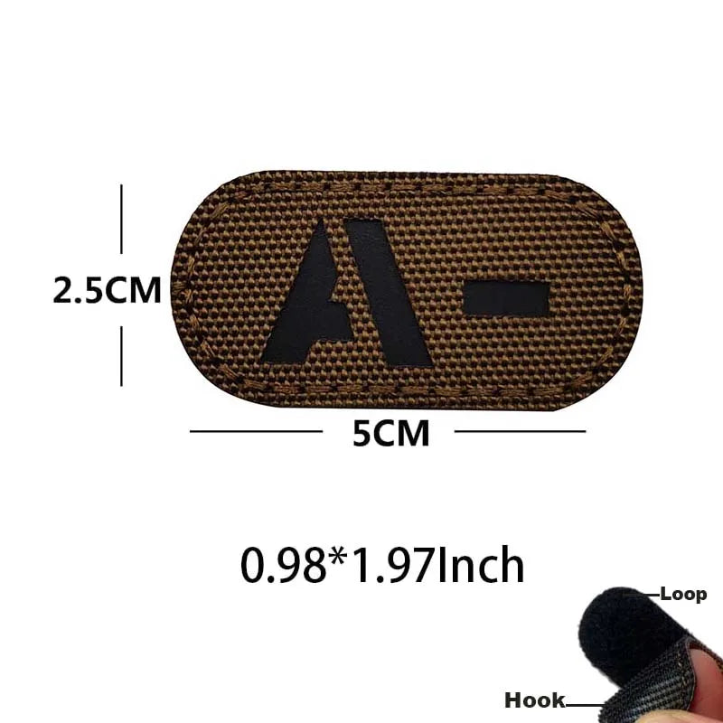 A rectangular brown glow-in-the-dark tactical patch with a hook and loop backing shown next to a loop and hook.