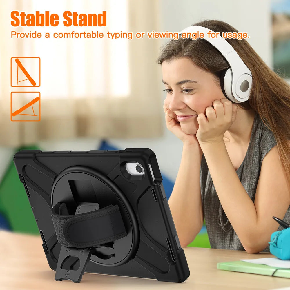 A woman is using a shockproof case with a stand for an iPad on a table.