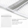Close-up of a white mesh laundry bag with a silver zipper, showing internal curling and ripstop fabric structure.