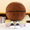 A brown plush toy resembling a sports ball sits on a stack of books.