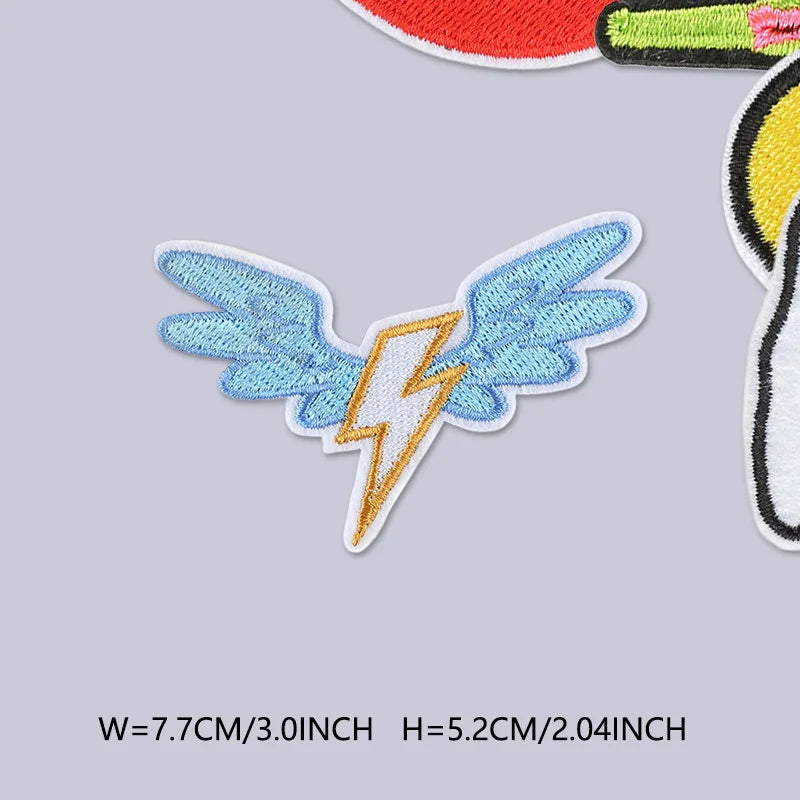 Light blue embroidered lightning bolt wing patch for clothing