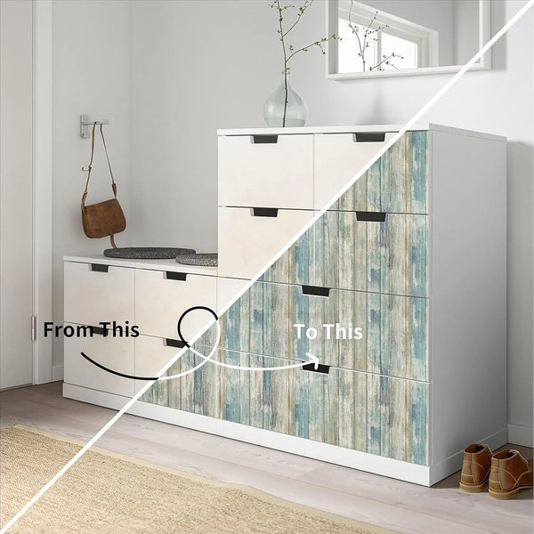 White cabinet with wood grain peel and stick wallpaper featuring blue and gray tones.