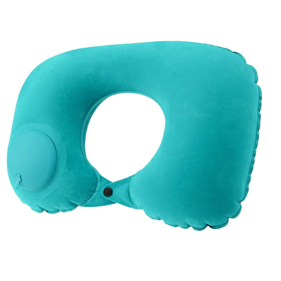 A teal self-inflating travel neck pillow with a soft flocking cover.