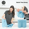 A woman is using a blue microfiber tear-away towel roll for kitchen cleaning.