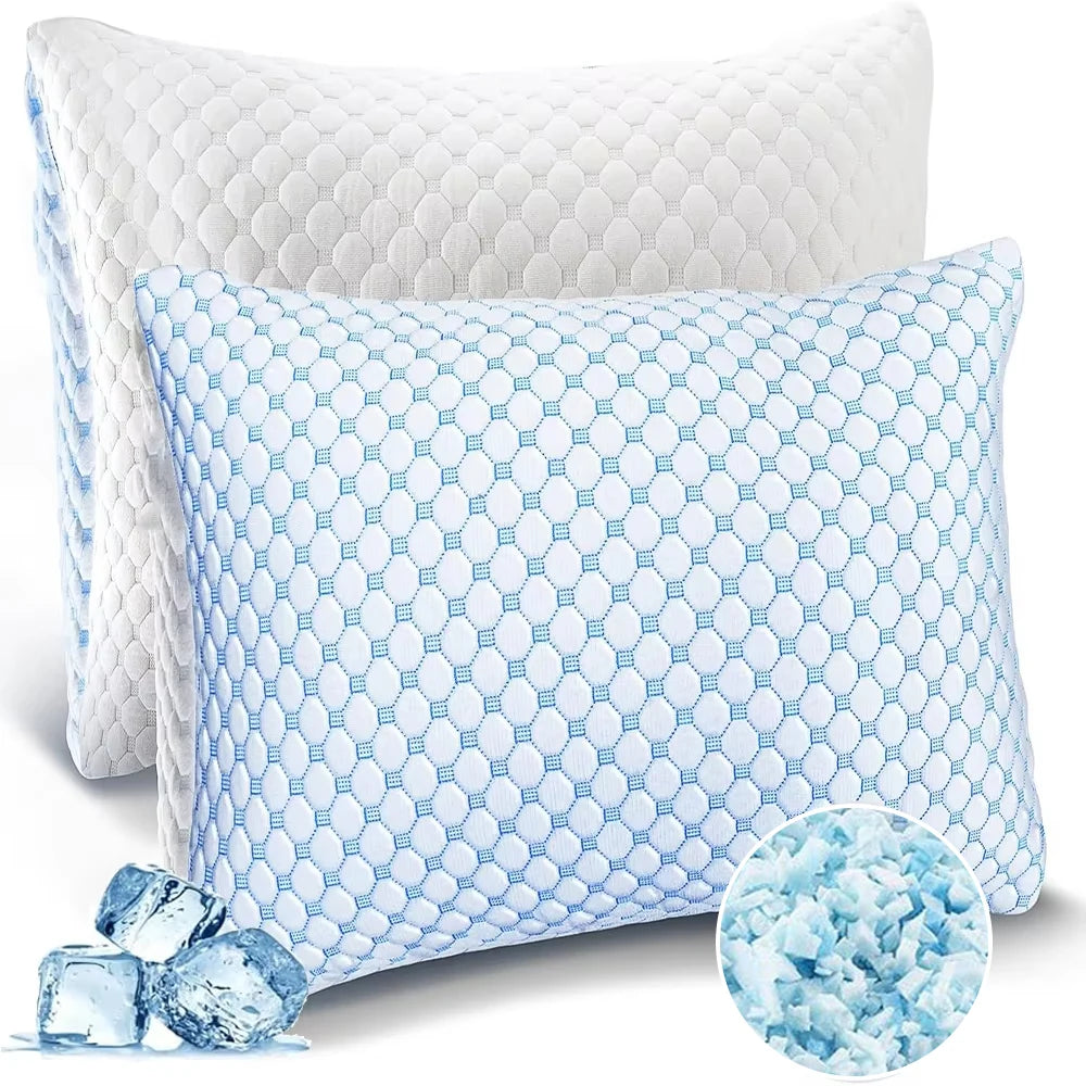 A light blue patterned memory foam pillow with a white quilted cover and loose blue foam pieces.