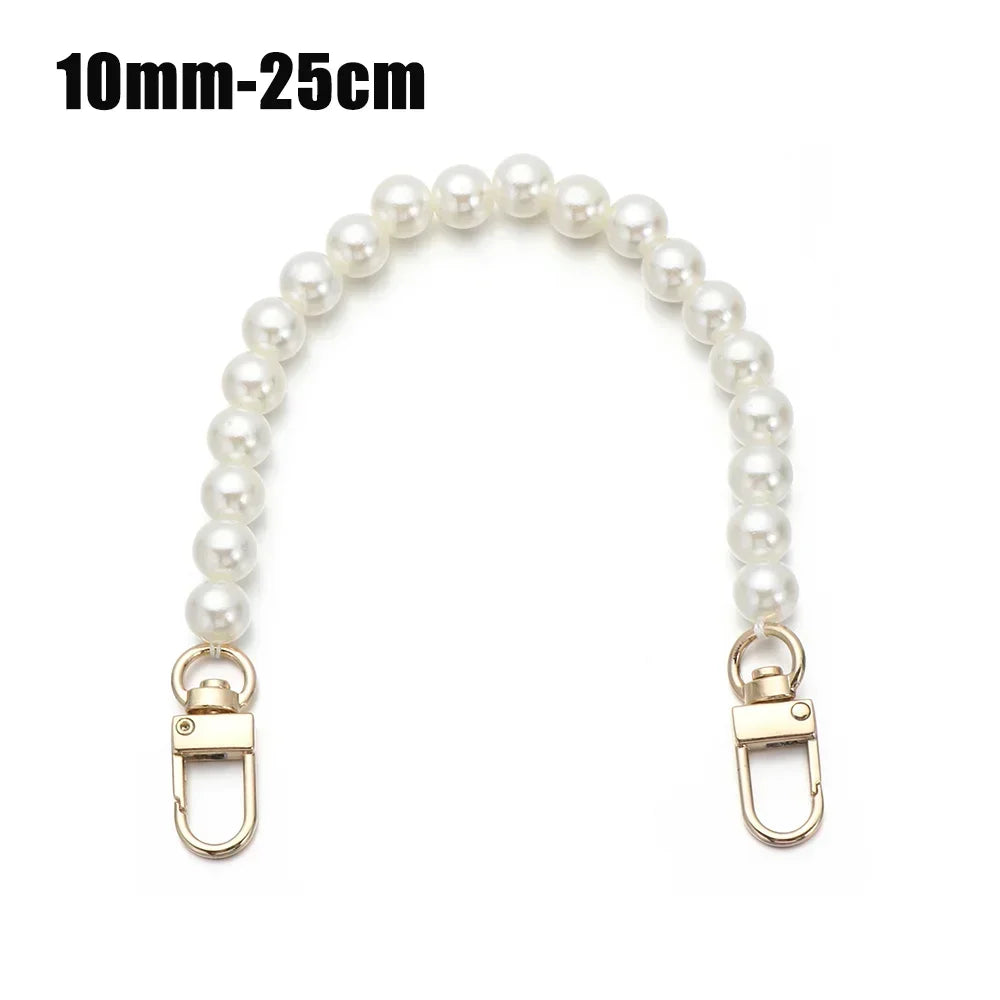 A strand of white pearls used as an elegant chain strap for handbags or DIY purses.