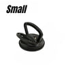 A black heavy-duty suction cup dent puller tool.