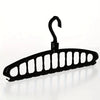 Black multi-layer space-saving closet organizer hangers with a curved hook.