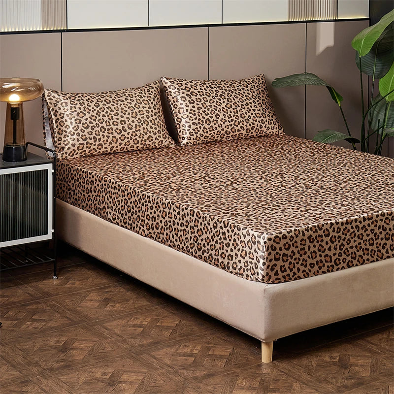 A bed with leopard print bedding set featuring brown and black spots on a beige duvet.