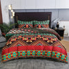 A richly patterned boho duvet cover set featuring geometric stripes in red, green, and black on a bed.