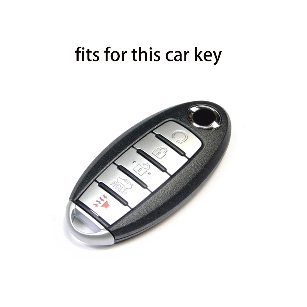 A close-up view of a black silicone key fob cover with various buttons and a silver trim.