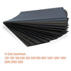 A fan of black sandpaper sheets with various grits ranging from 120 to 3000.