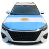 White car hood covered with the flag of Panama, featuring blue and white stripes and a golden sun emblem.