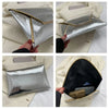 Silver crocodile pattern PU envelope clutch with a gold trim and coin pocket shown in various angles.