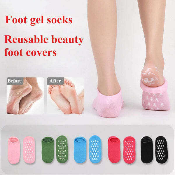 A variety of reusable silicone moisturizing foot covers in various colors are displayed next to a model's foot.