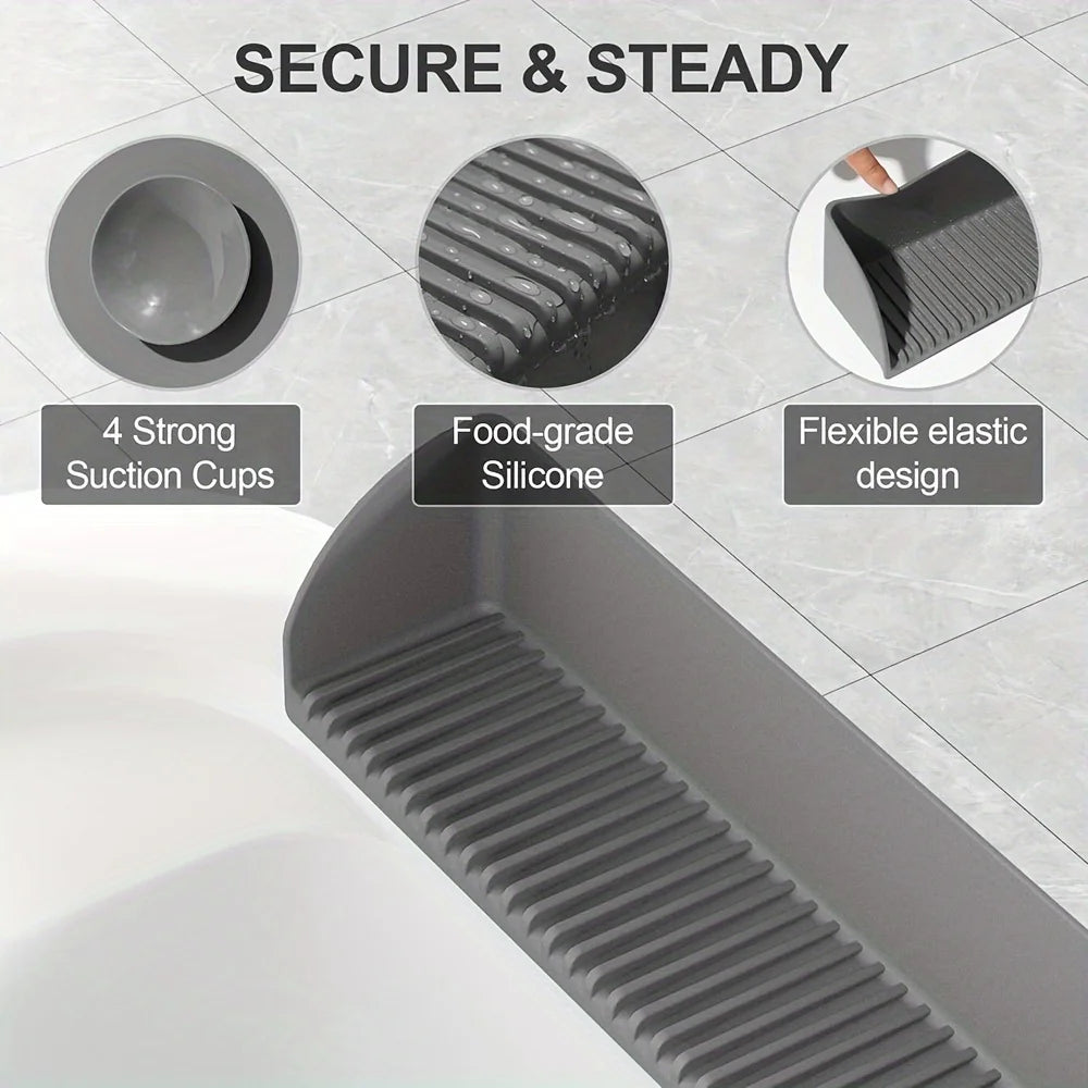 A silicone sink splash guard with a textured, flexible design and four strong suction cups shown in a close-up view.