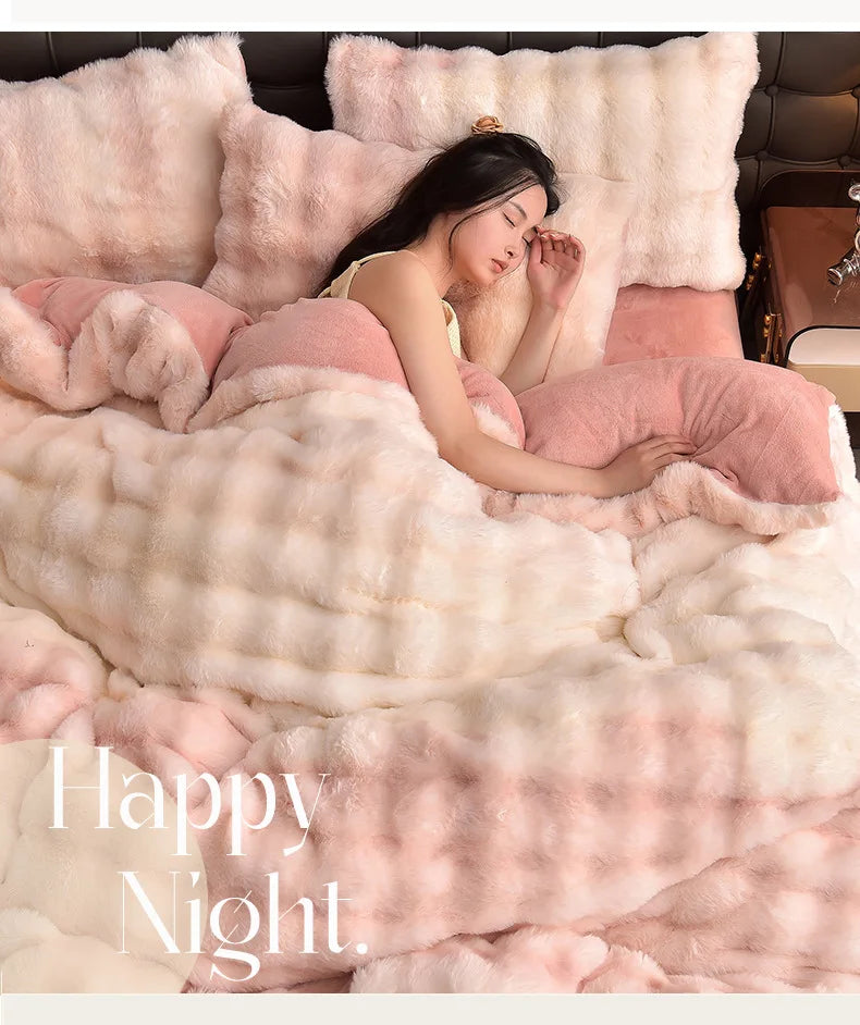 A woman rests her head on a fluffy pink faux fur pillow in a luxurious bedding set.
