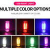 Multiple color options of a USB night light featuring glass accents displayed in various lighting conditions.