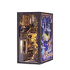 A dark wooden book nook kit featuring detailed miniature bookshelves and scenes with LED lighting.