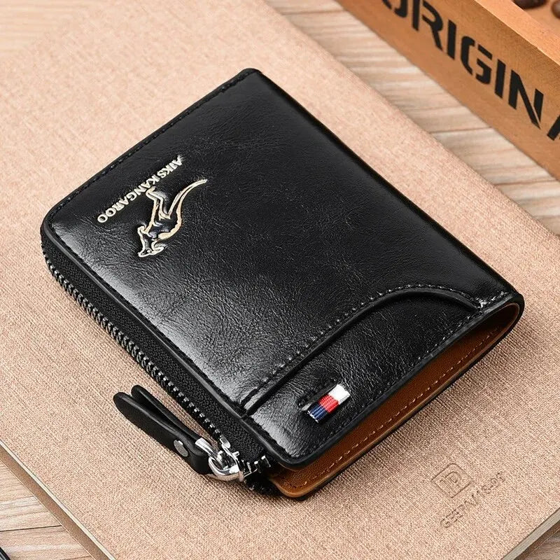 Black leather men's wallet with a zipper and a silver logo resting on a light brown surface.