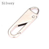 A silver metal zipper pull with a loop for replacement or repair.