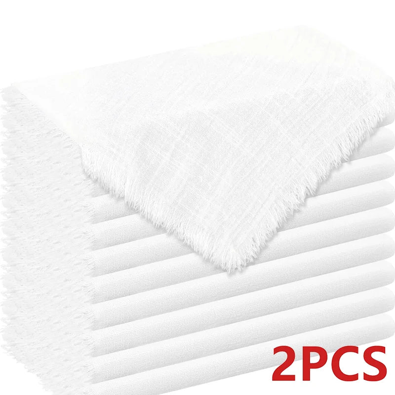 A stack of six white raw-edge polyester cloth napkins is shown in a close-up view.