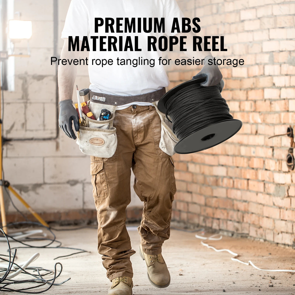 A person holds a spool of premium abs material rope reel for storage.