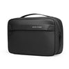 Black waterproof travel toiletry bag with a handle and a logo on the front.