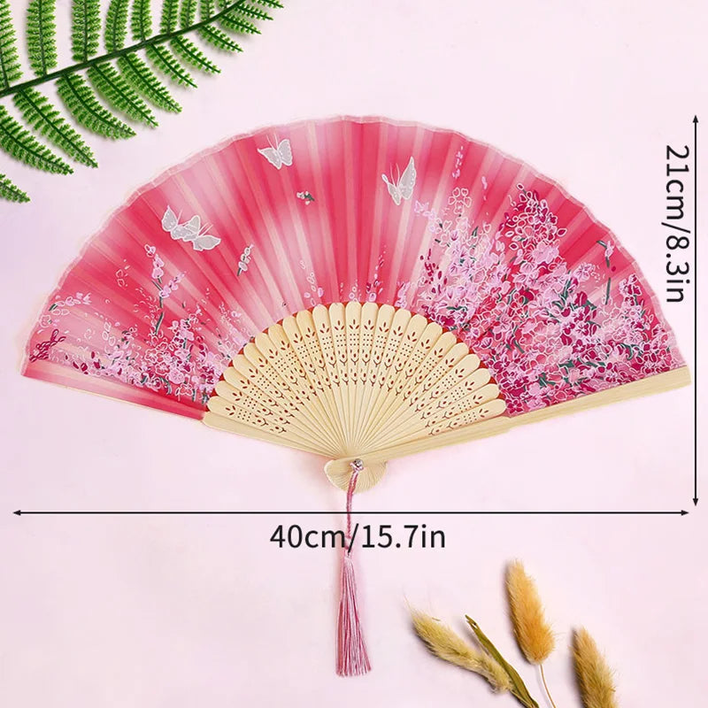 Pink and white floral lace folding hand fan with a natural wood handle