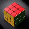 A 3x3 magnetic speed cube with a mirror finish, featuring red and yellow faces.