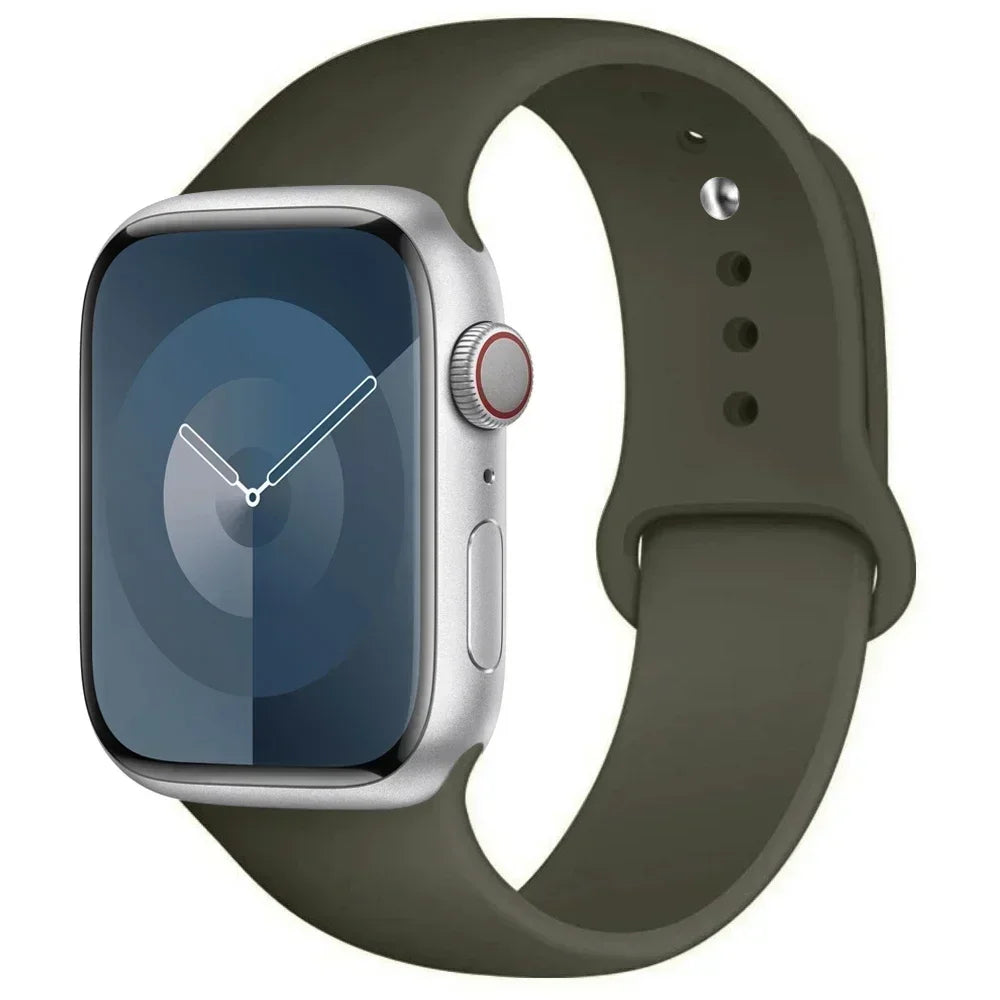 A silver Apple Watch encased in a dark olive silicone sport band.