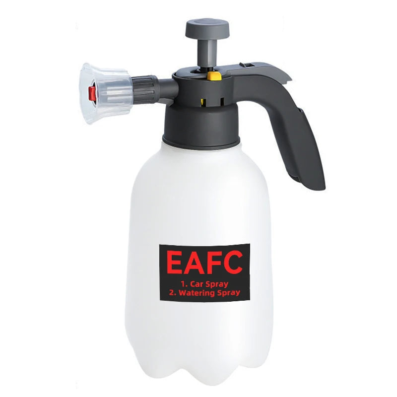 A white 2L hand pump foam sprayer with a black handle and nozzle for car or garden use.