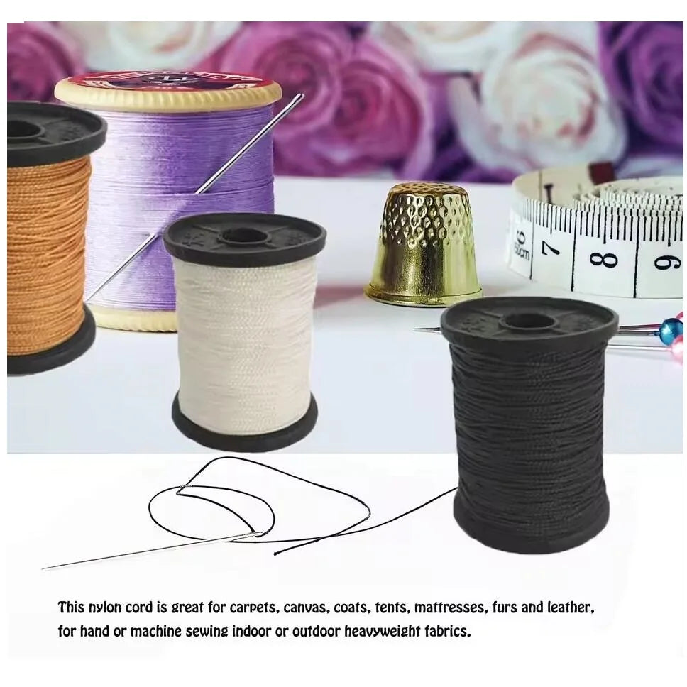 A collection of spools of waxed nylon thread and sewing needles for leather, canvas, and heavy-weight fabrics.