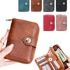 Various colors of vintage RFID blocking short wallets and card holders shown with a leather wallet.