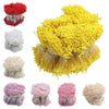A collection of 400 pearl flower stamens in various shades of yellow, white, and pink for DIY crafts and wedding decor.