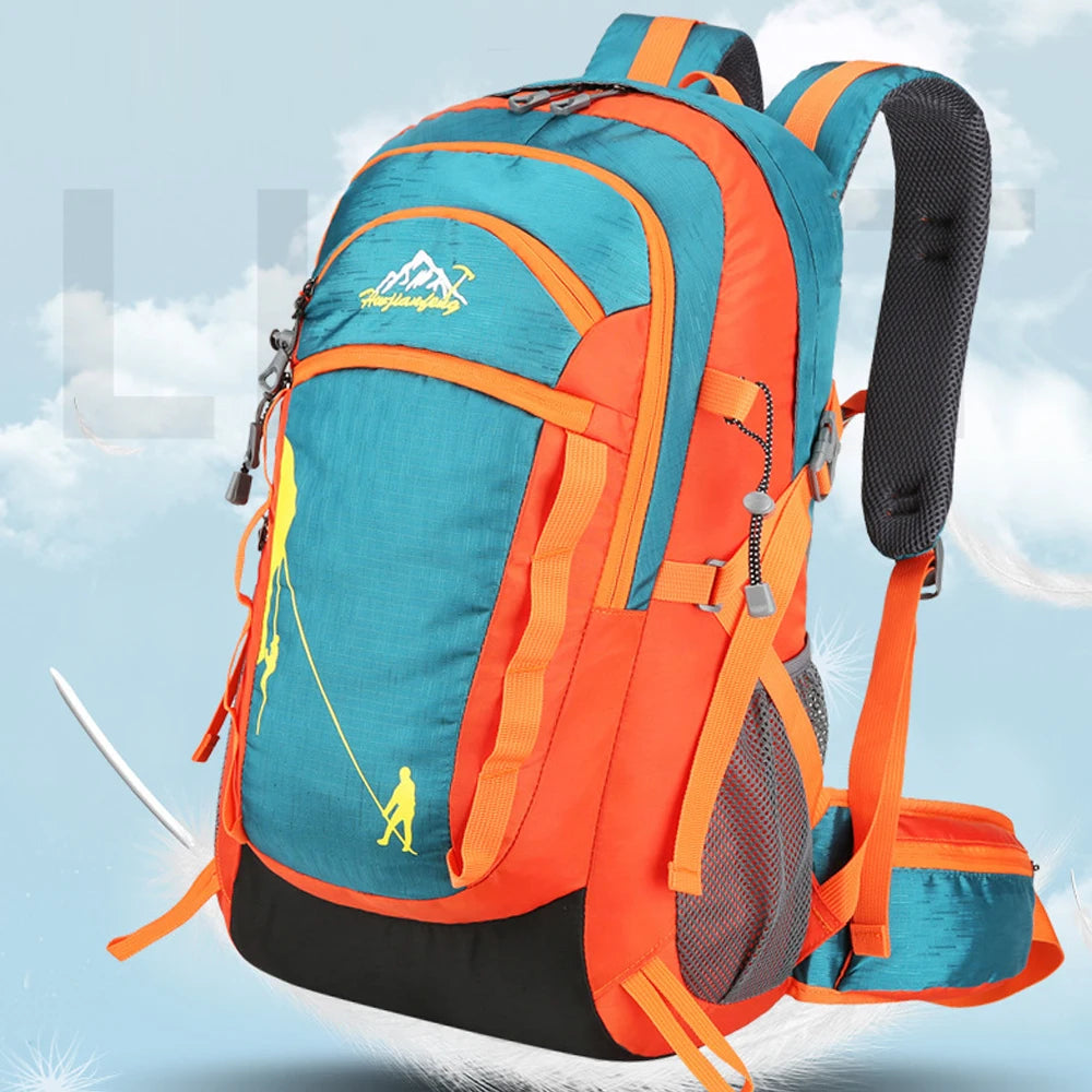 An orange and teal hiking backpack is shown against a light blue sky with white clouds.