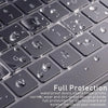 A close-up of a laptop keyboard covered in water droplets, demonstrating full protection for the device.