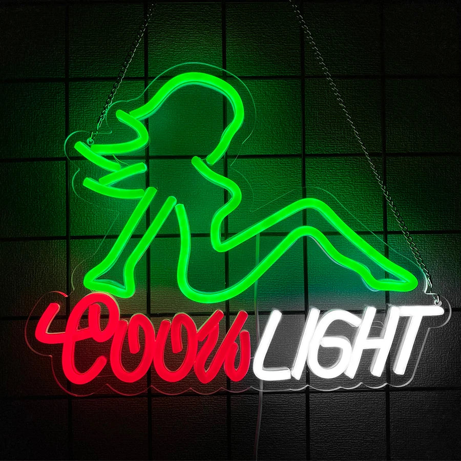 Neon sign featuring a green silhouette of a person and red text that reads COOL LIGHT