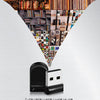 A compact black USB flash drive is shown at the tip of a pyramid formed by various media and books.