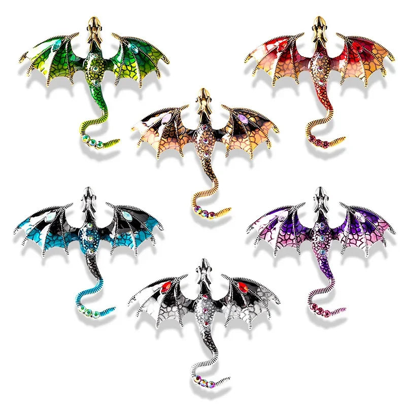 A set of five enamel dragon brooches featuring various colors and rhinestone accents.