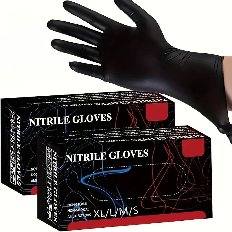 A hand wearing a black nitrile disposable glove is shown next to a box of nitrile gloves.