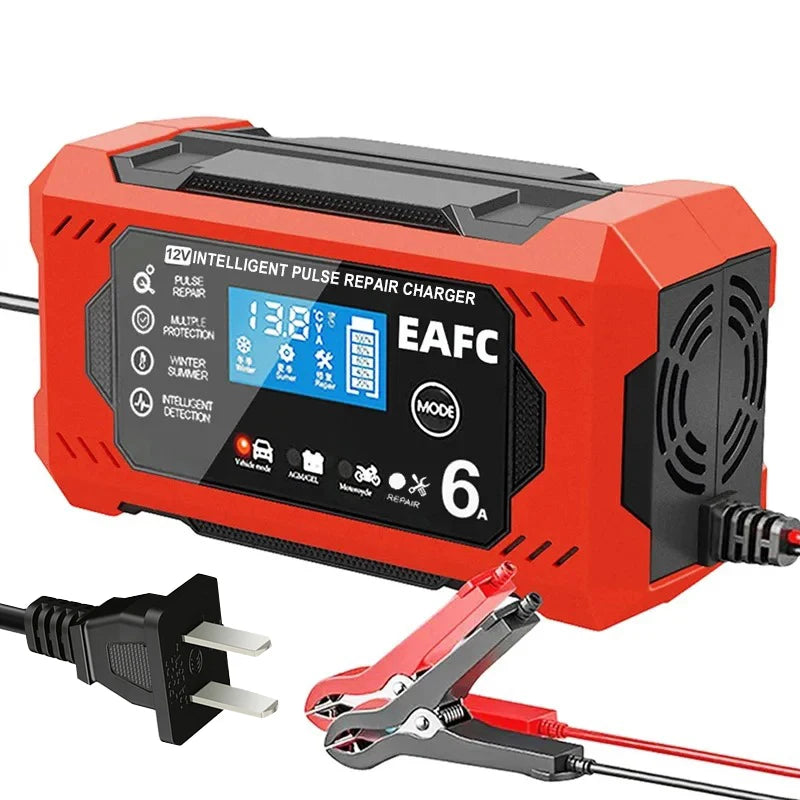 An orange battery charger with an LCD display and clamp is shown next to a power cord.