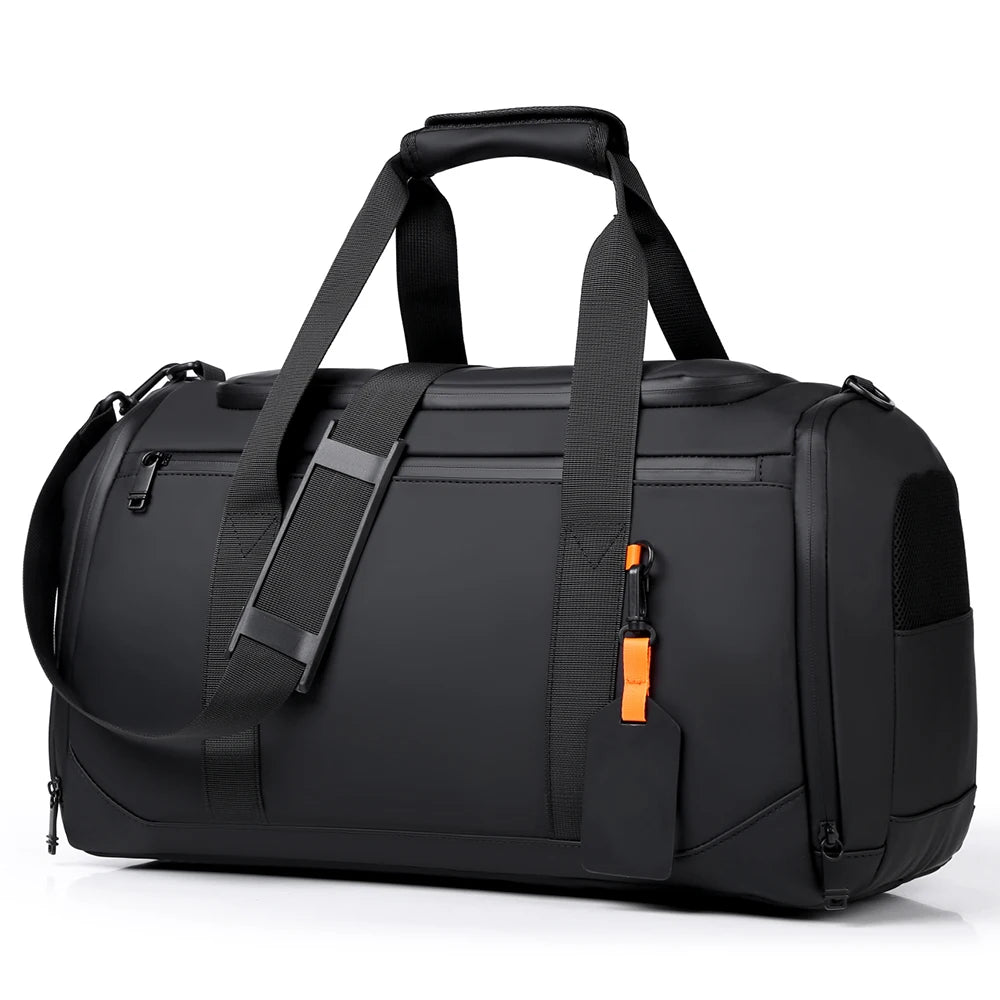 A black large capacity travel duffel bag with padded straps and a zipper pull visible from the top.