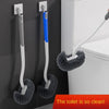 A toilet brush and stand set with a long handle and fuzzy brush cleaning the toilet bowl.
