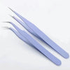 A pair of light purple macaron color craft tweezers for use in scrapbooking and journaling