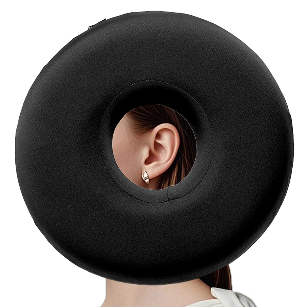 Black memory foam ear piercing pillow with a cutout for side sleepers